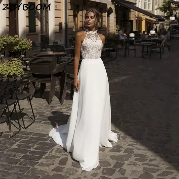 Robe de mariée dos nu en dentelle et mousseline avec découpes et fente haute, traîne courte, pour fe