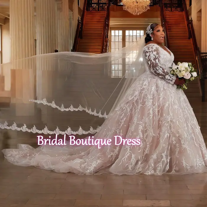 Robes de mariée grande taille à manches longues
