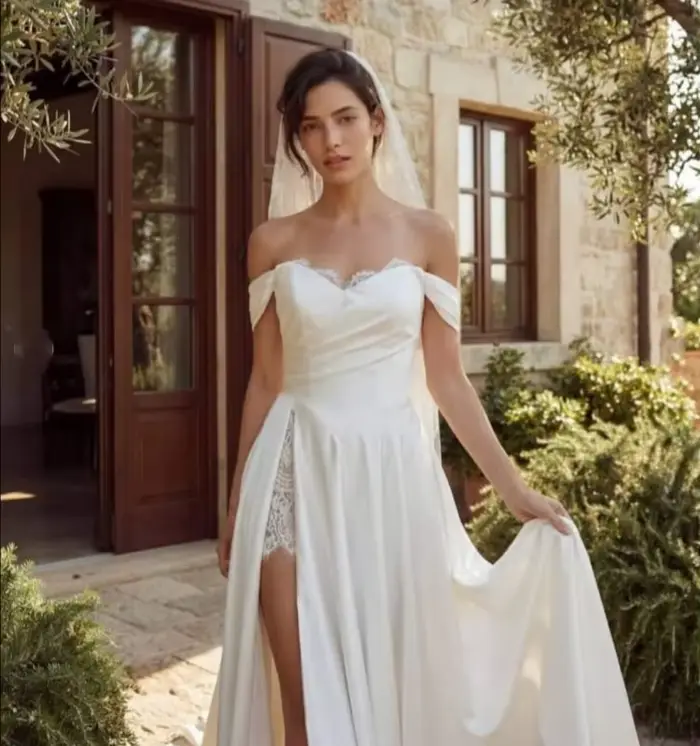 Robe de mariée de plage en dentelle élégante style bohème basque sexy fente haute manches courtes col cœur ligne A robes de mariée 2026