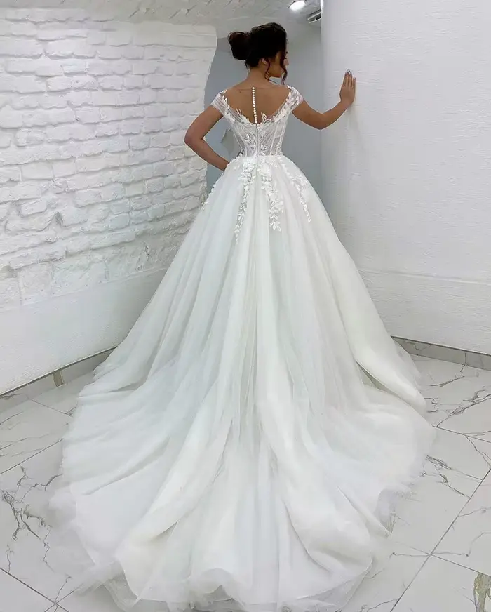 Robe de mariée princesse décolleté en V sans manches ornée de dentelle 3D et appliques pour femmes occasions spéciales soirée gala mariage