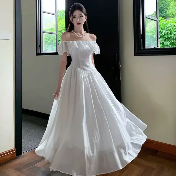 Robe longue blanche été 2025 col carré taille empire manches volantes asymétrique à une épaule jupe trapèze pour femme occasions spéciales
