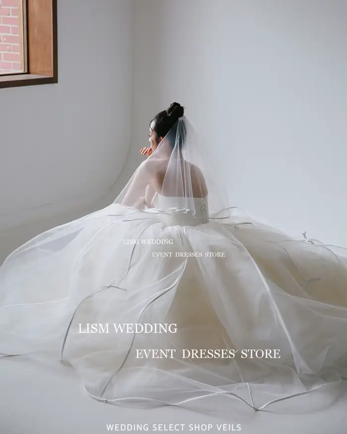 LISM élégant bretelles une ligne corée robes de mariée fée Tulle arc robe