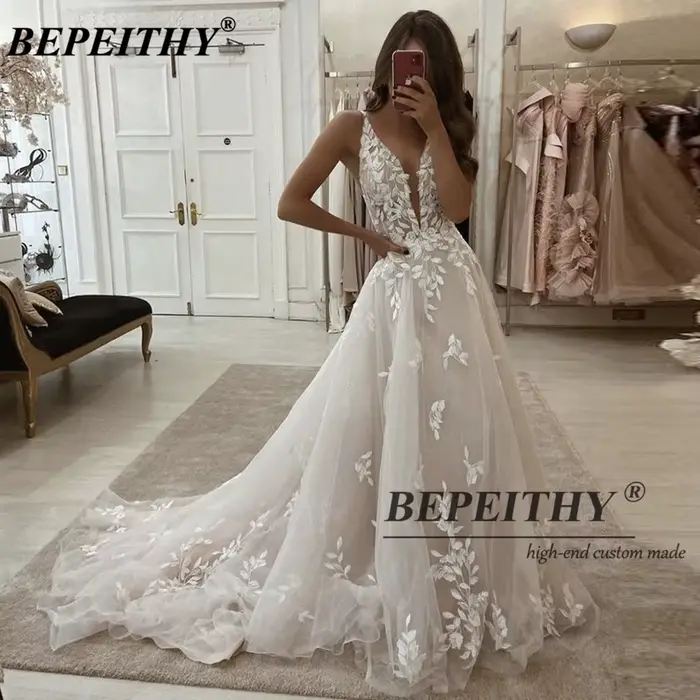 Robes de mariée personnalisées BEPEITHY sexy en dentelle coupe trapèze pour jeunes femmes françaises 2026